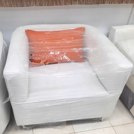 White Chair with Orange Cushion | Rukan Al Fareed